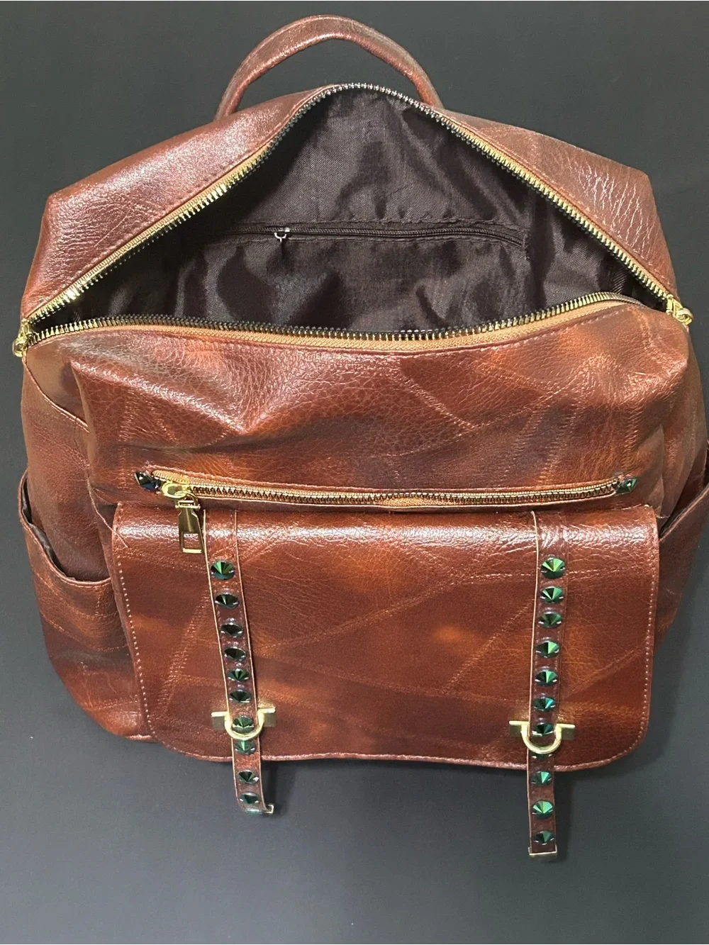Woman’s Brown Faux Leather Backpack with Green Stud Accents